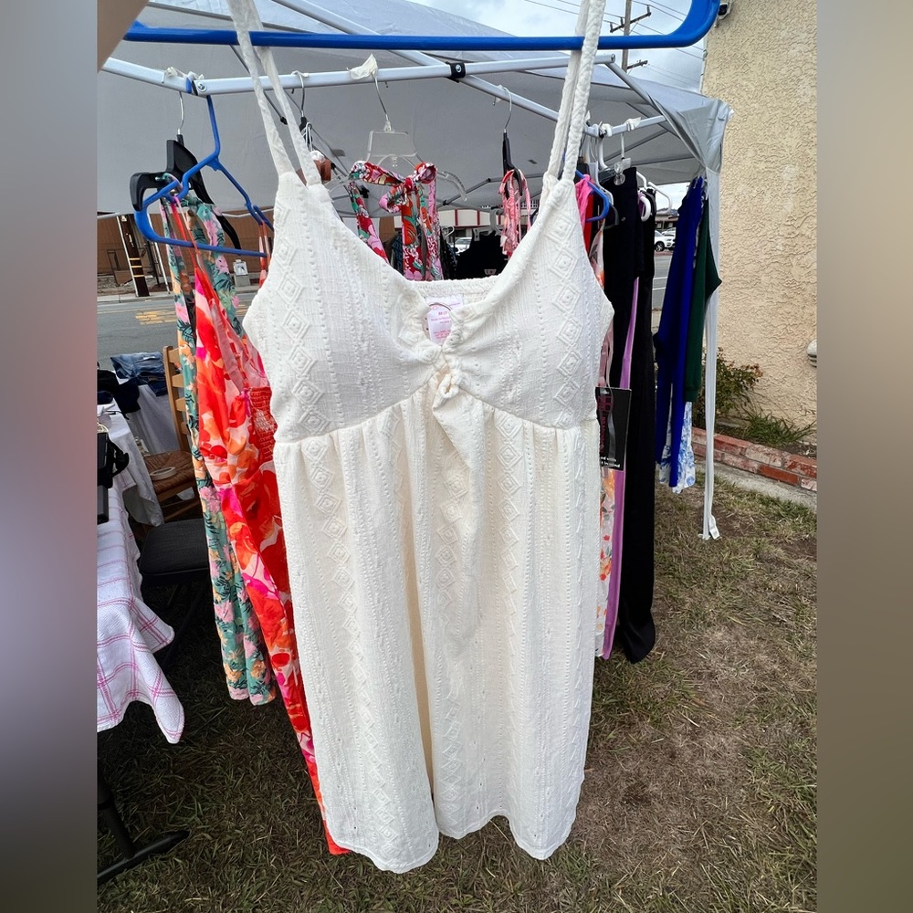 Beautiful white dress! I would pair with some tights, comfy boots, leg warmers